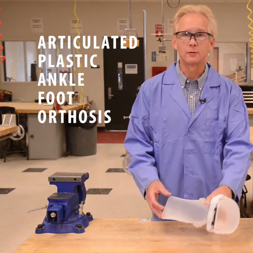 Othortist working on an articulated plasic ankle foot orthosis